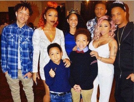 A family photo of TI Family.